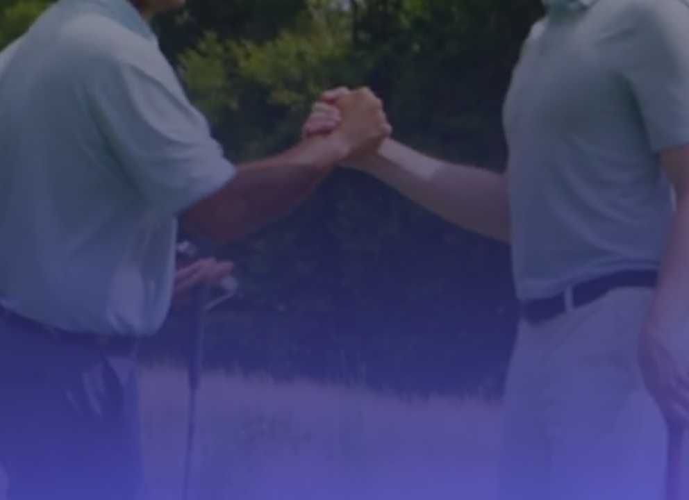 Two people shaking hands, symbolizing partnership and success